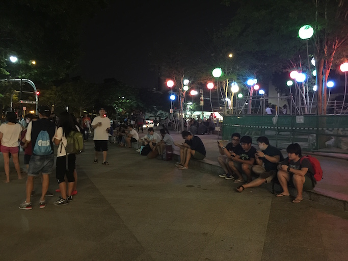 Pokemon Go jilaxzone.com Pokemon craze in Singapore in front of the Cathay